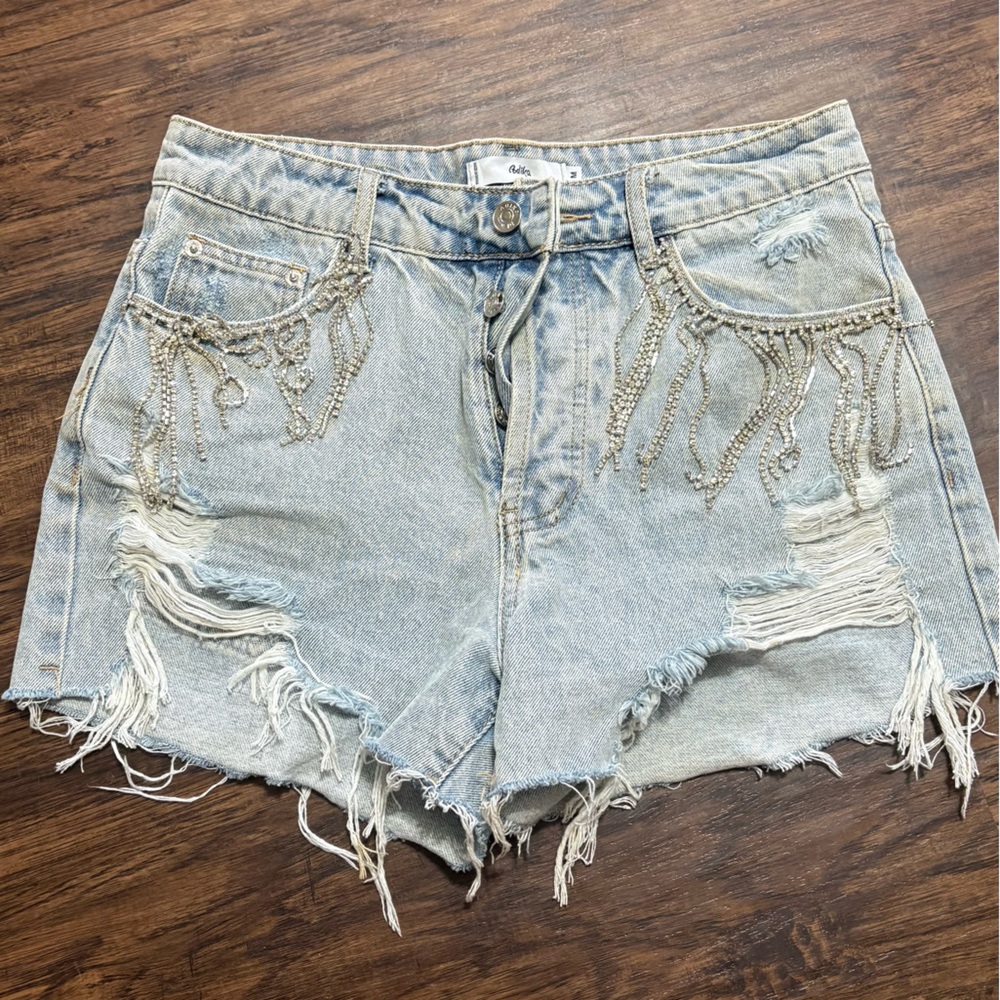 Blue jean shorts with tassels